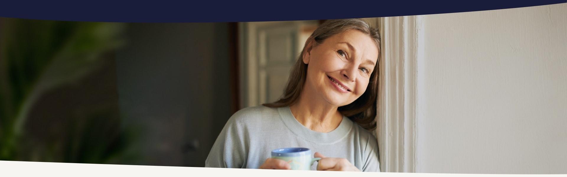 woman holding a cup