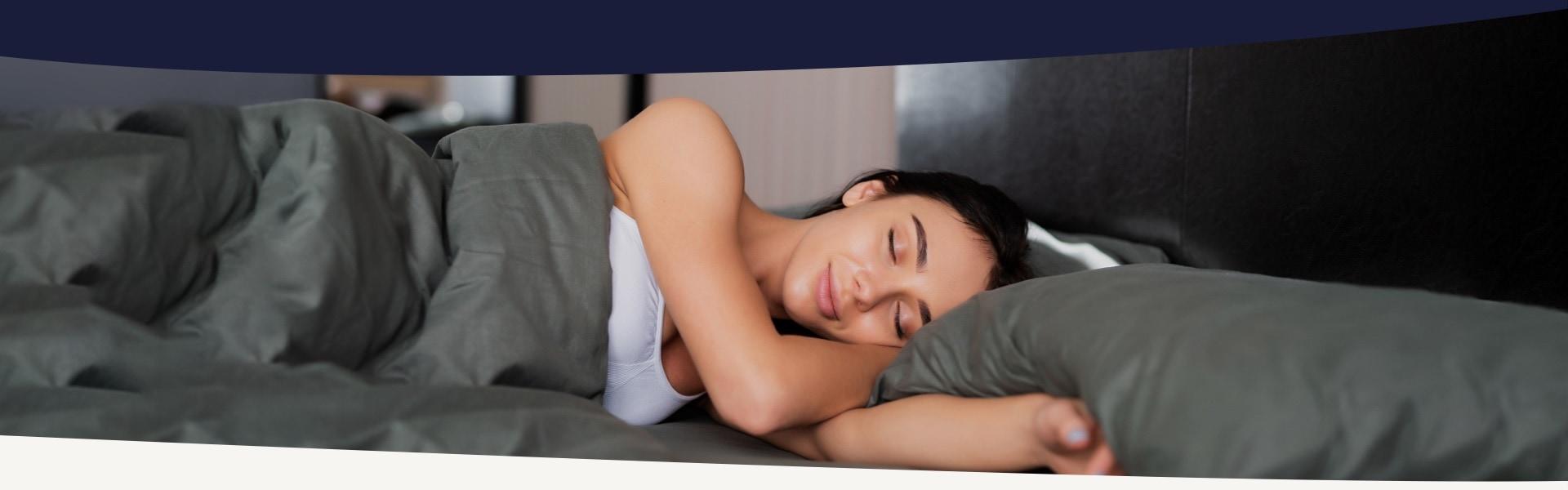 Woman sleeping in bed