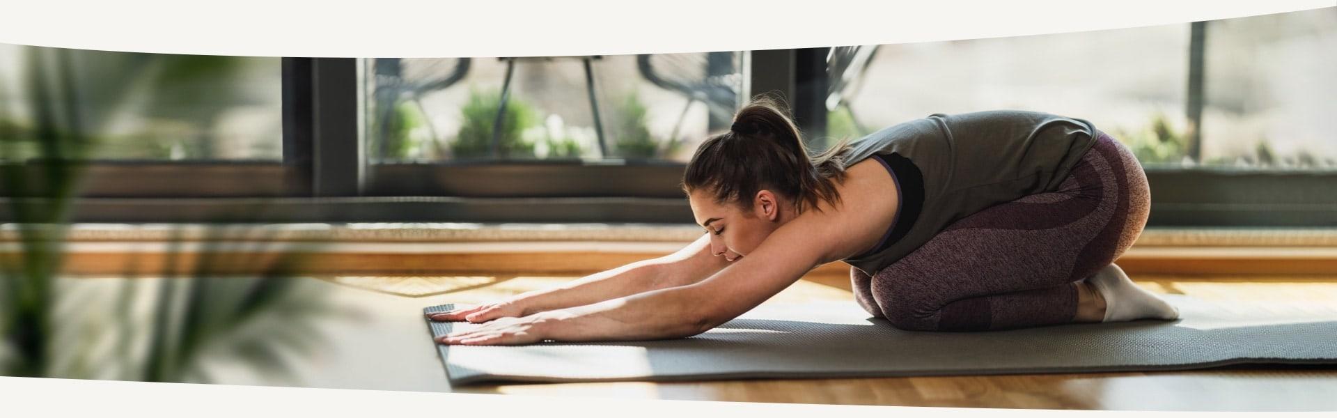 woman practicing yoga